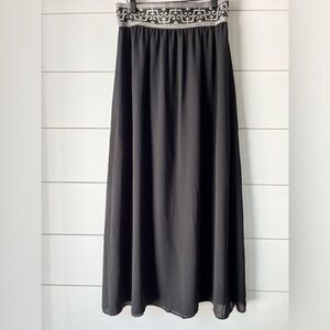 Aina Be full‎ length sheer tapestry waist band, A-line skirt.